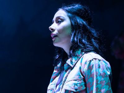 Guildhall singer in blue light